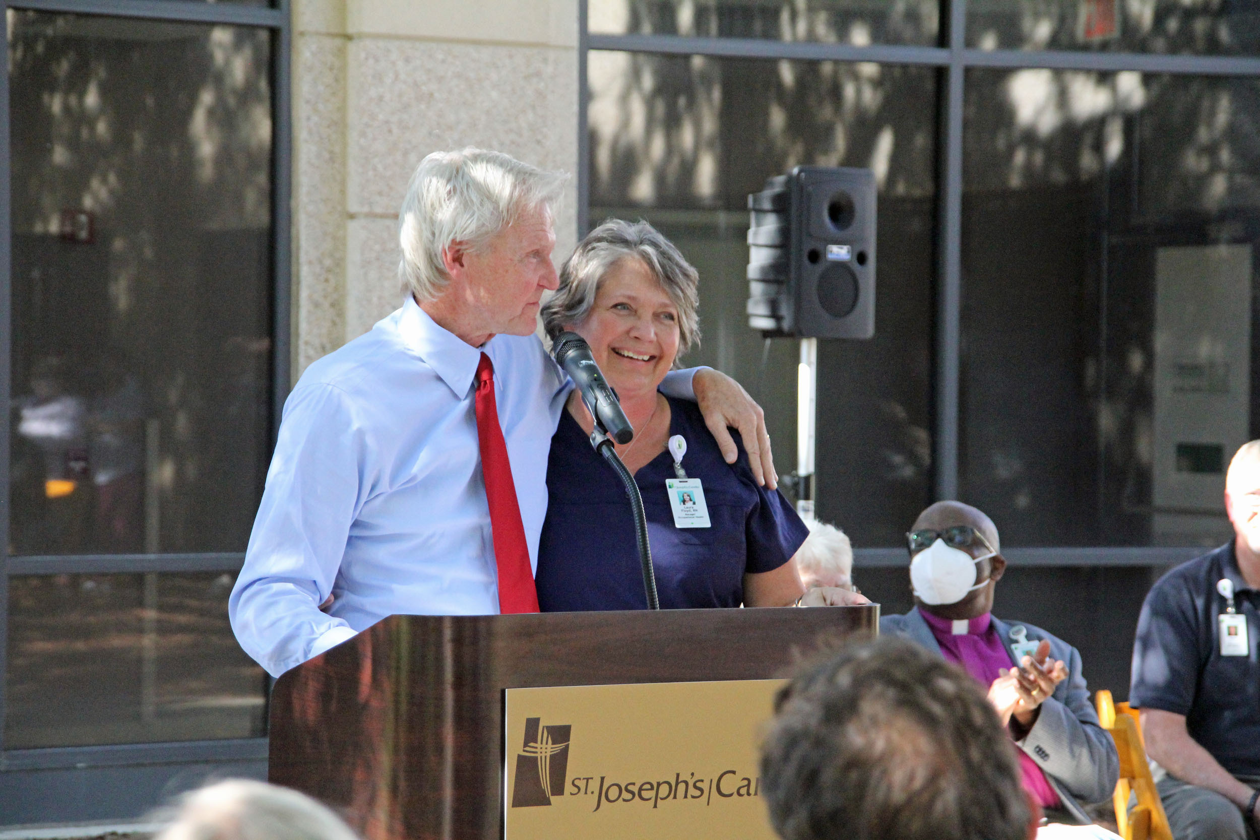 Laura Floyd, recipient of the 2021 James R. Lientz Humanitarian Award, with SJ/C President & CEO Paul P. Hinchey.