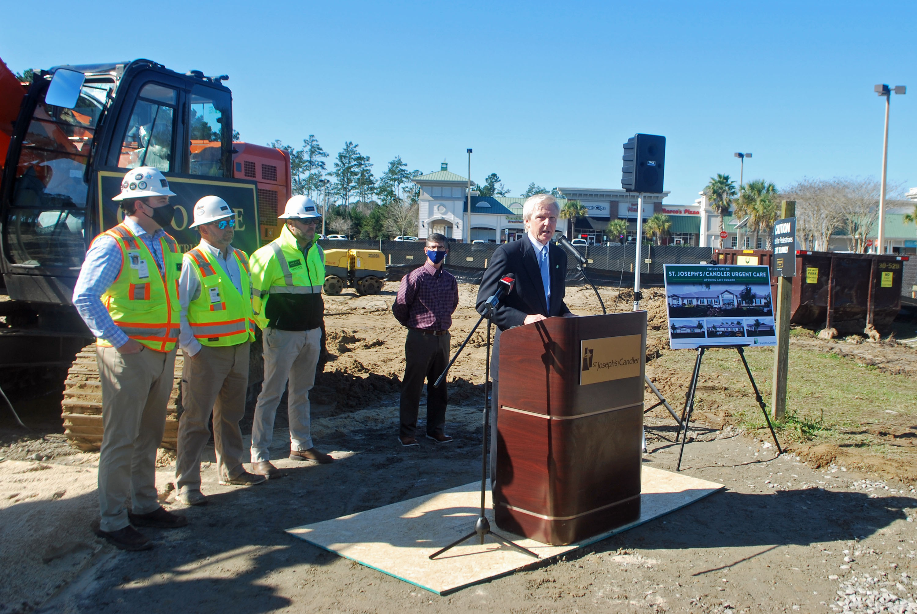 Paul P. Hinchey, President & CEO of SJ/C speaks at a podium during the groundbreaking ceremony for a new urgent care facility in Richmond Hill.